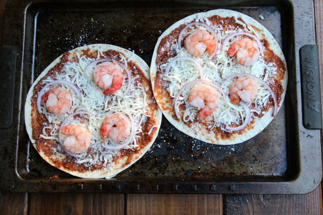 Shrimp pizza on oven pan