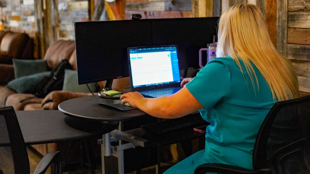 Virtual IOP at Eating Disorder Solutions Case Worker on Computer