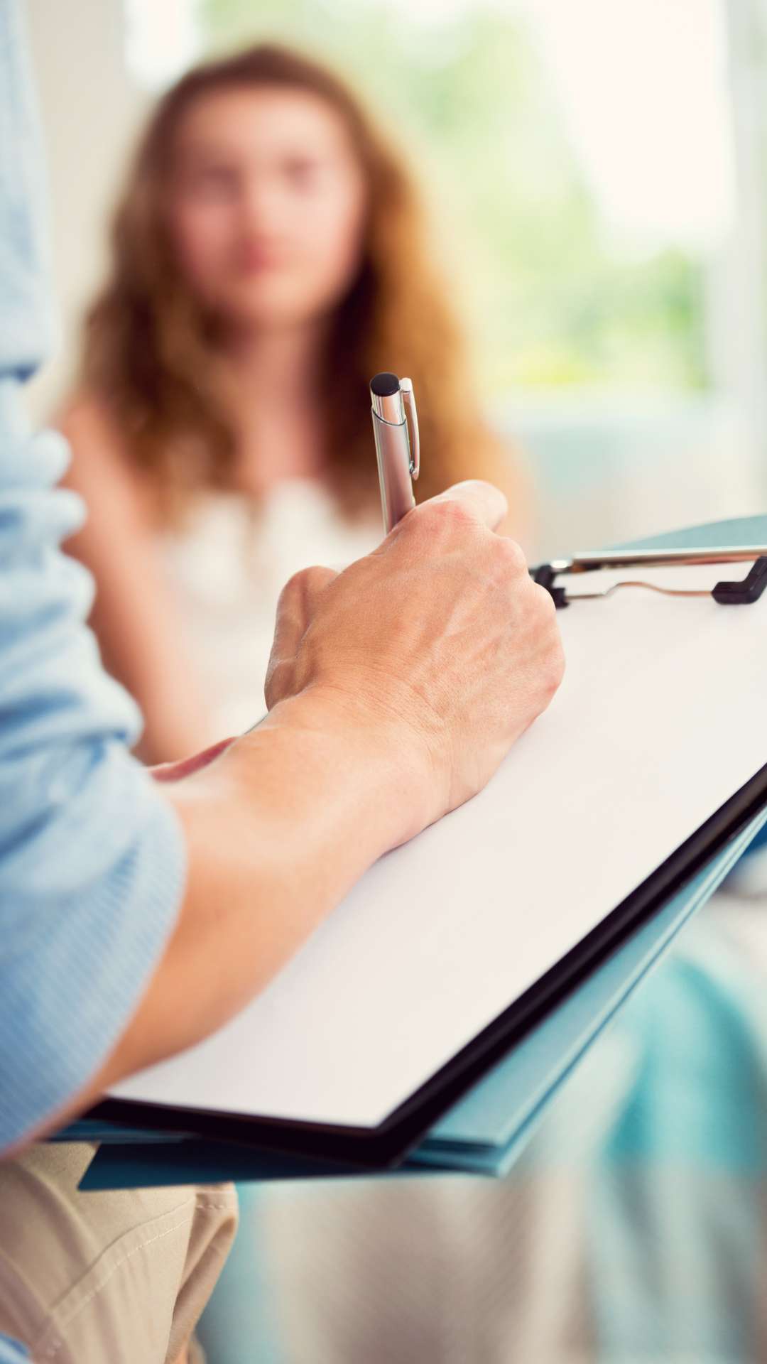 Therapist and client discussing eating disorder recovery strategies in IOP therapy session at Eating Disorder Solutions Weatherford