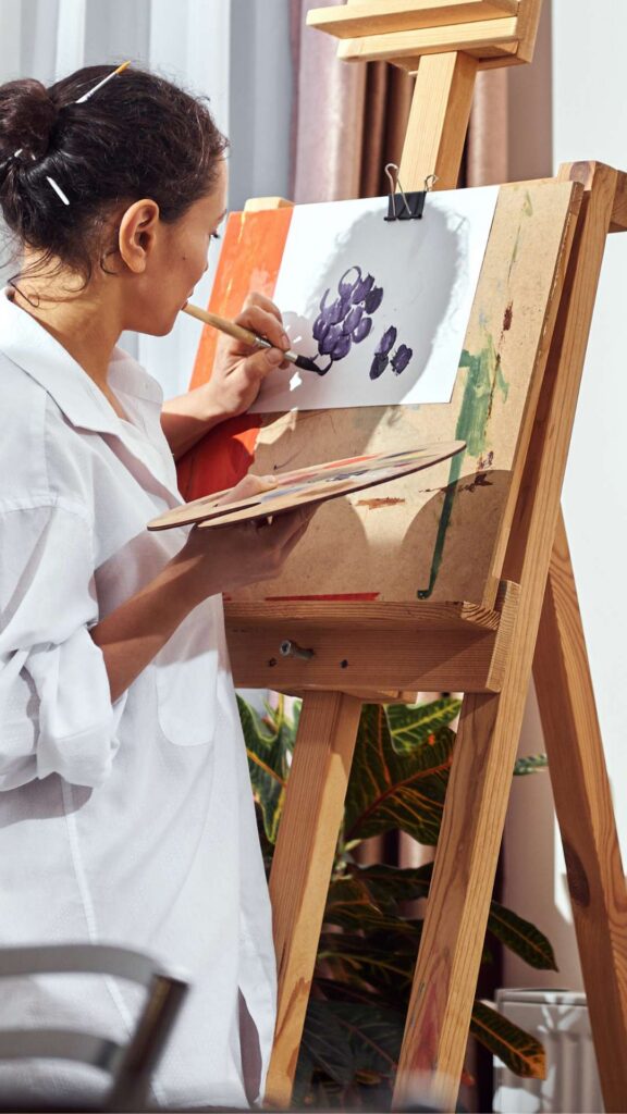 Colorful art supplies and creative materials representing expressive therapy techniques for eating disorder recovery