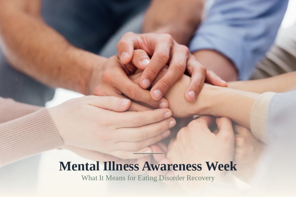 Group of people stacking hands together in a circle, symbolizing community support for Mental Illness Awareness Week and eating disorder recovery